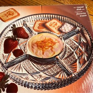 Laura Glass work’s international, 9 1/2” crisal glass with 5 sections